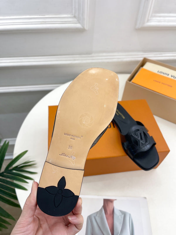 isola flat mule black calfskin