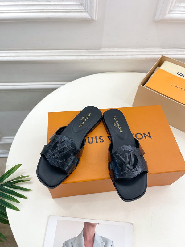 isola flat mule black calfskin