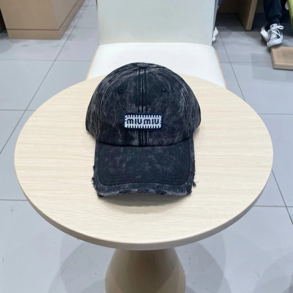 MM DISTRESSED FABRIC BASEBALL CAP IN BLACK WITH EMBROIDERED LOGO