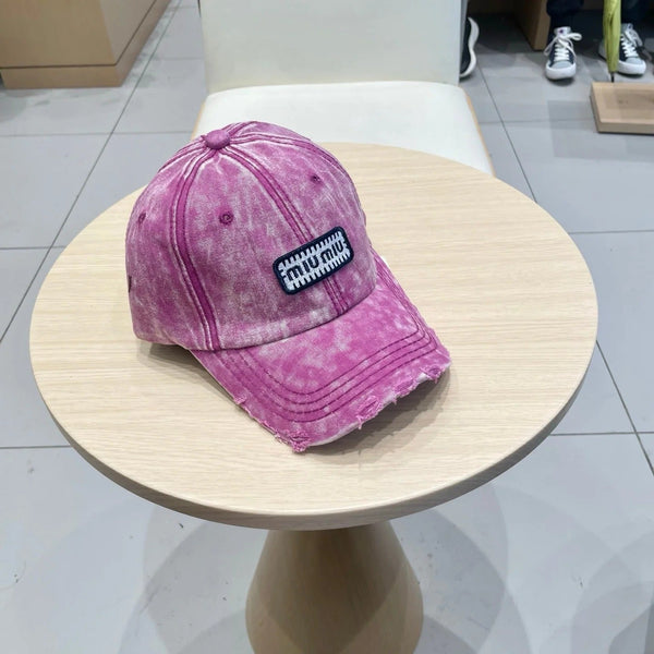 MM DISTRESSED FABRIC BASEBALL CAP IN PINK WITH EMBROIDERED LOGO