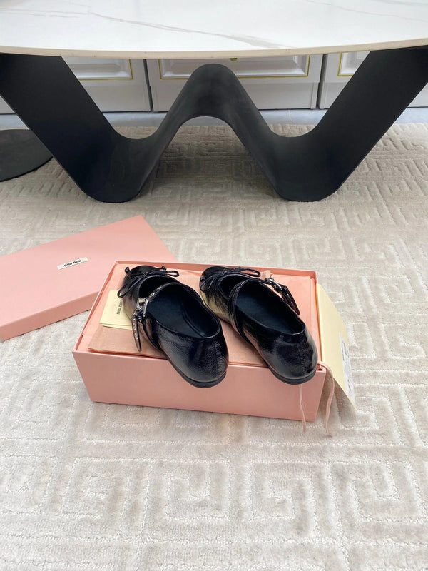 BOW MARY JANE FLAT IN BLACK NAPLAK LAMBSKIN