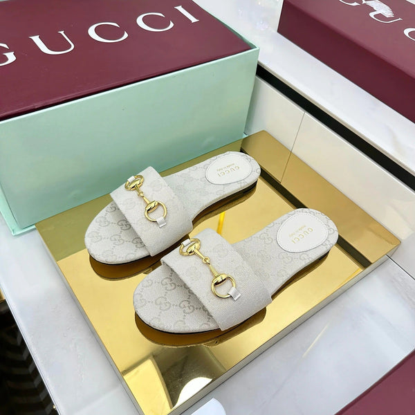 GG SLIDES IN IVORY WITH GOLD HARDWARE