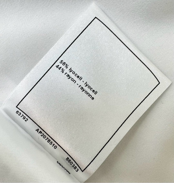 CHANEL HIGH-WAIST SKIRT WITH CUT-OUT HEM 274762