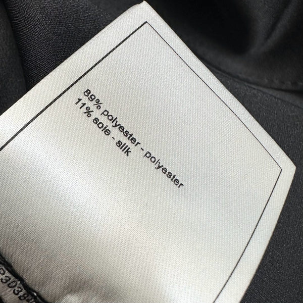 CHANEL SLEEVELESS ROUND-NECK BUTTON-UP TOP 274769