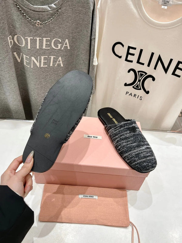 KNITTED MULES IN BLACK MIX WHITE WOOL